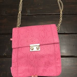Pink snake skin purse